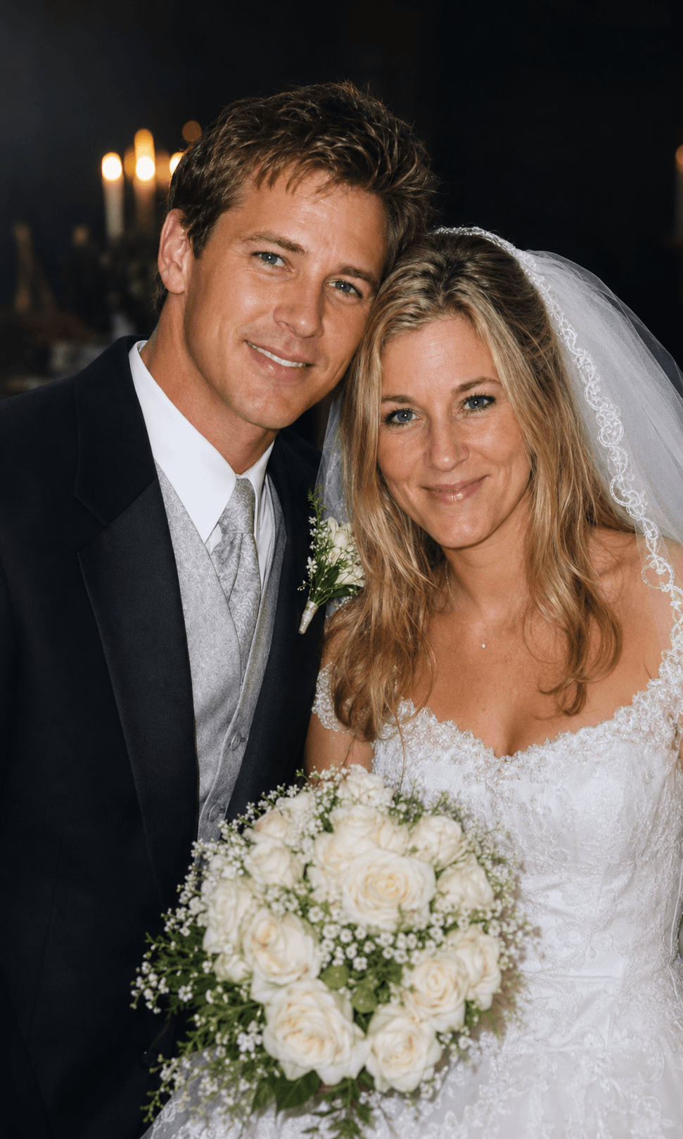 A newlywed couple smiling closely together