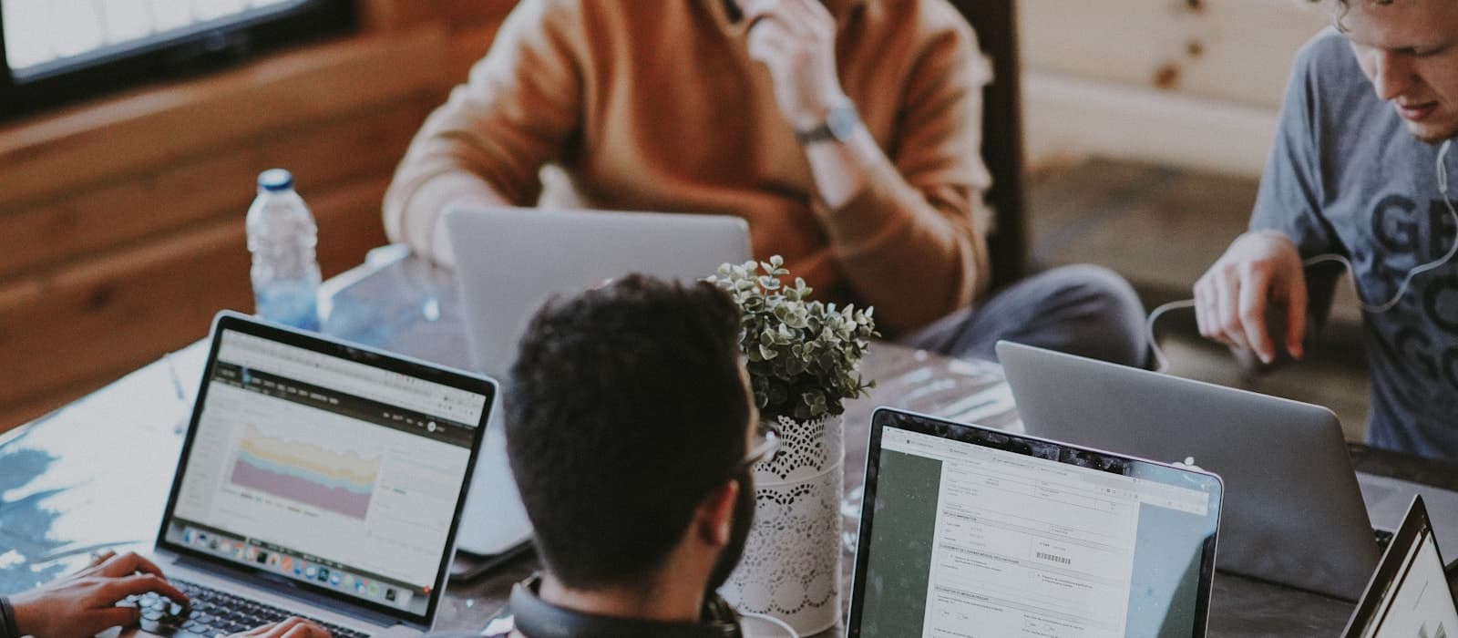 Coworkers collaborating around a table